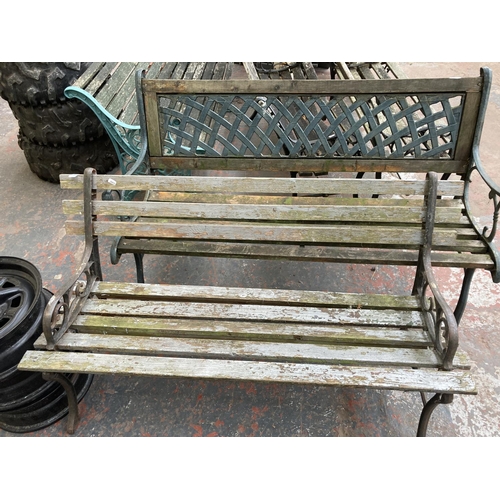 725 - Two cast iron and wooden slatted garden benches