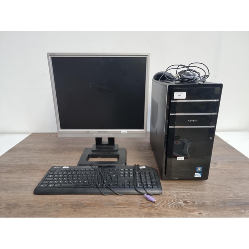 545 - An Advent Windows 7 desktop PC with monitor, keyboard and mice