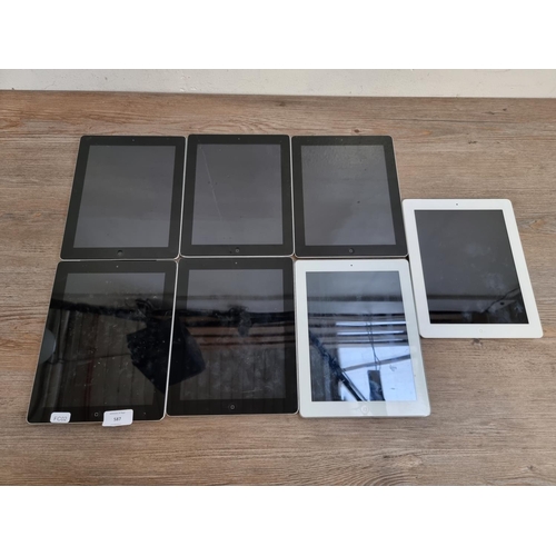 587 - Seven Apple iPad tablets, five A1416 and two A1430