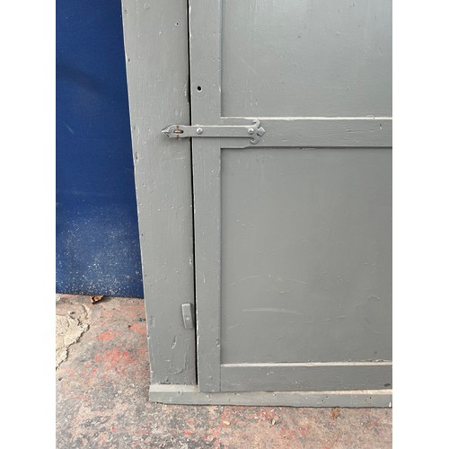 298A - A vintage grey painted pine single door school cabinet - approx. 176cm high x 110cm wide x 37cm deep