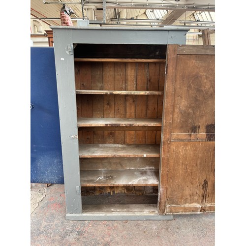 298A - A vintage grey painted pine single door school cabinet - approx. 176cm high x 110cm wide x 37cm deep