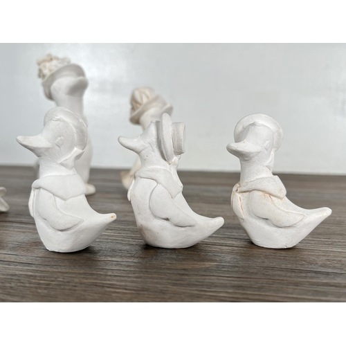 155 - A Bossons unpainted prototype eight piece chalkware duck family with certificate of authenticity