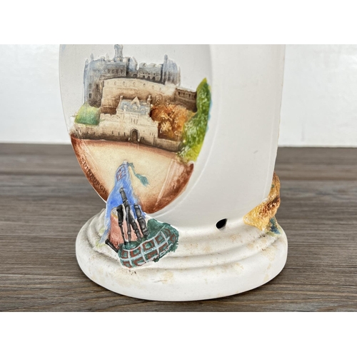 164 - A Bossons pottery 22cm table lamp depicting Edinburgh Castle, Balmoral Castle and Glamis Castle with... 