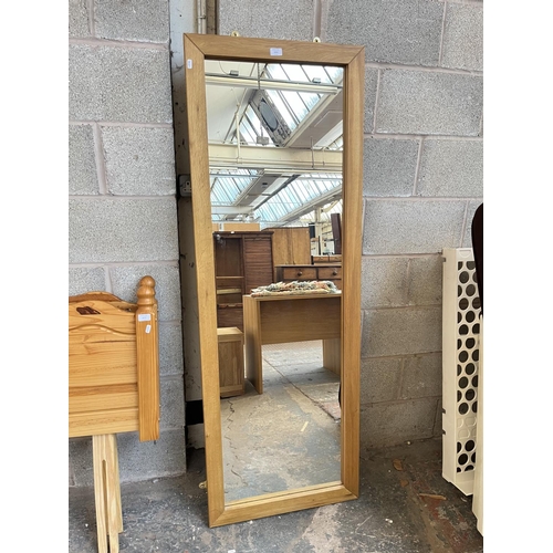 1022 - A modern oak framed wall mirror - approx. 170cm x 60cm