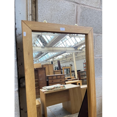 1022 - A modern oak framed wall mirror - approx. 170cm x 60cm