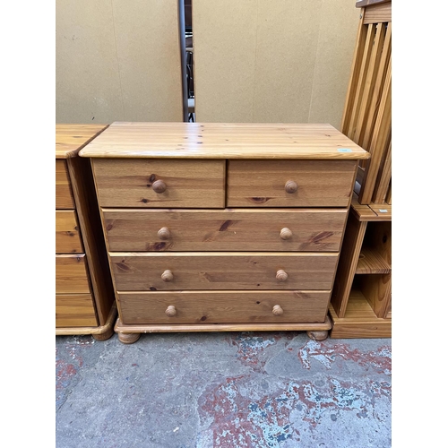 1025 - A modern pine chest of two short over three long drawers