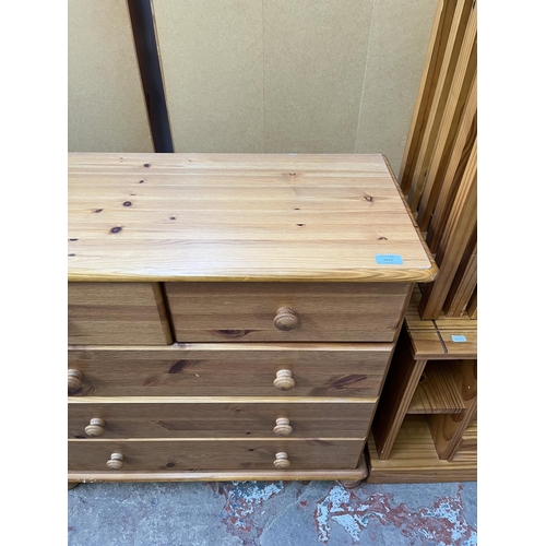 1025 - A modern pine chest of two short over three long drawers