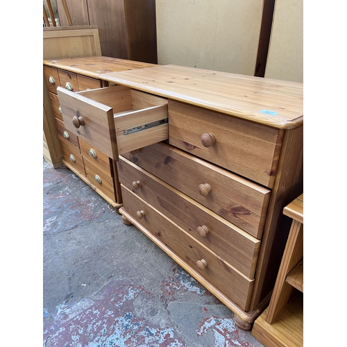 1025 - A modern pine chest of two short over three long drawers