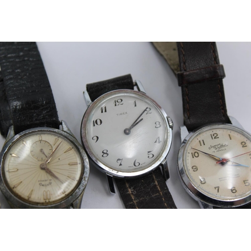 2157 - Four vintage mechanical men's wristwatches, one Antima, one Medana, one Timex and one James Walker