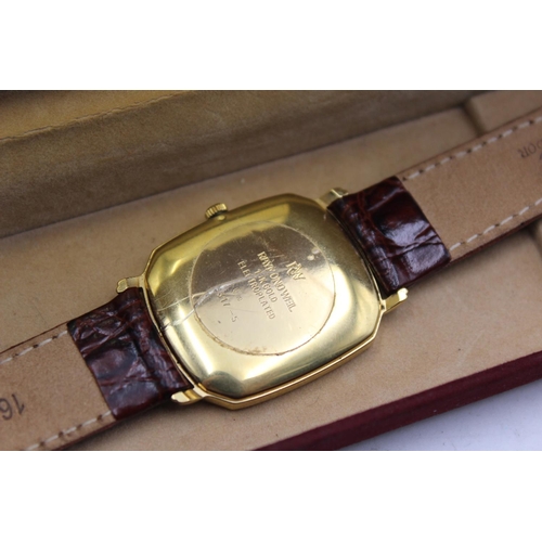 2178 - A boxed Raymond Weil Geneve gold tone quartz men's wristwatch with brown leather strap