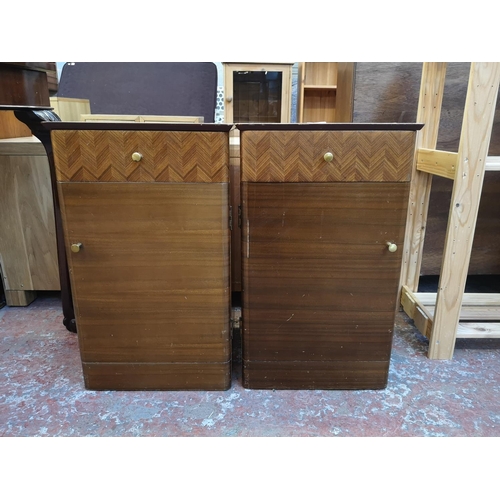 1037 - A pair of mid 20th century Uniflex walnut bedside cabinets - approx. 62cm high x 37cm wide x 35cm de... 