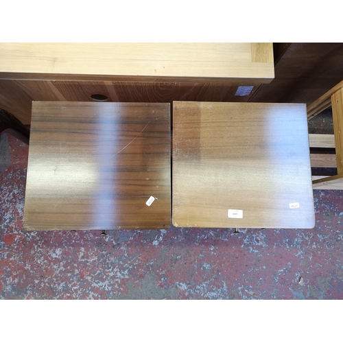 1037 - A pair of mid 20th century Uniflex walnut bedside cabinets - approx. 62cm high x 37cm wide x 35cm de... 