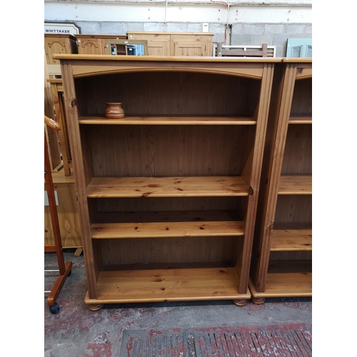 1046 - A modern pine four tier open freestanding bookcase