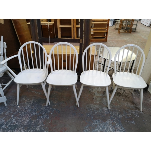 1056 - A set of four Ercol Windsor white painted dining chairs