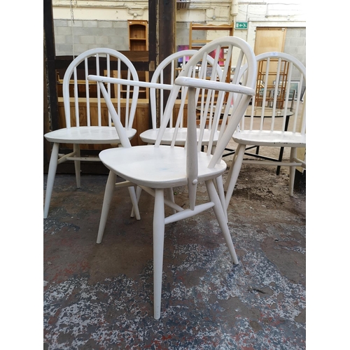 1056 - A set of four Ercol Windsor white painted dining chairs