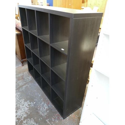 1061 - A modern black ash effect sixteen cube shelving unit - approx. 147cm high x 147cm wide x 39cm deep