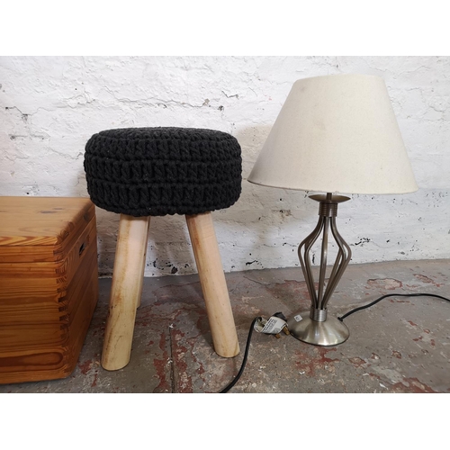 1074 - Four items, one grey woven footstool, one pine lidded box, one Homebase TM3987 table lamp and one br... 