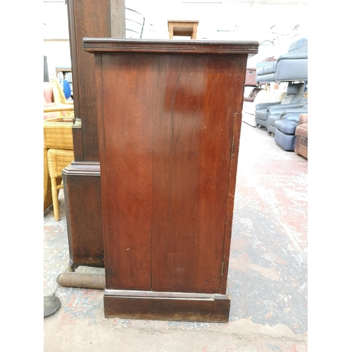 1075 - An Edwardian stained mahogany sideboard with two drawers and two lower cupboard doors - approx. 98cm... 