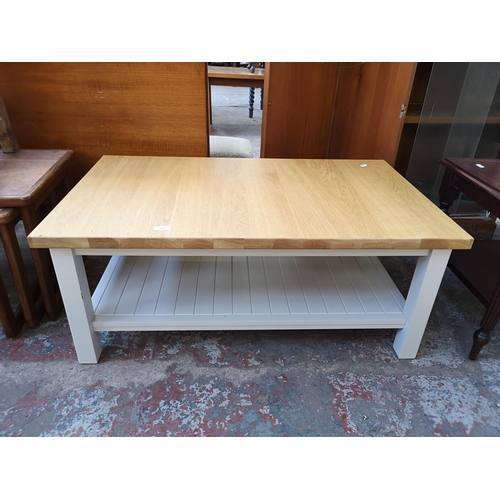 1089 - A modern solid oak and grey painted two tier rectangular coffee table - approx. 41cm high x 60cm wid... 