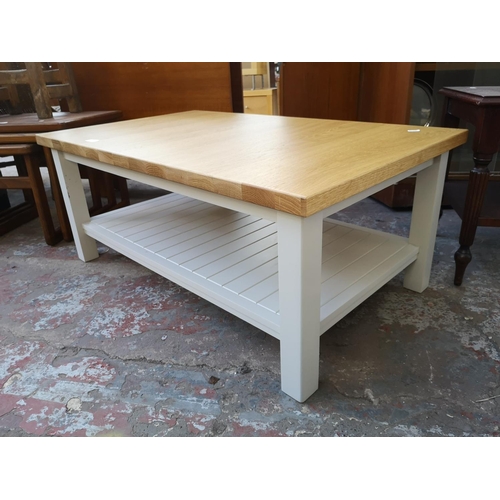 1089 - A modern solid oak and grey painted two tier rectangular coffee table - approx. 41cm high x 60cm wid... 