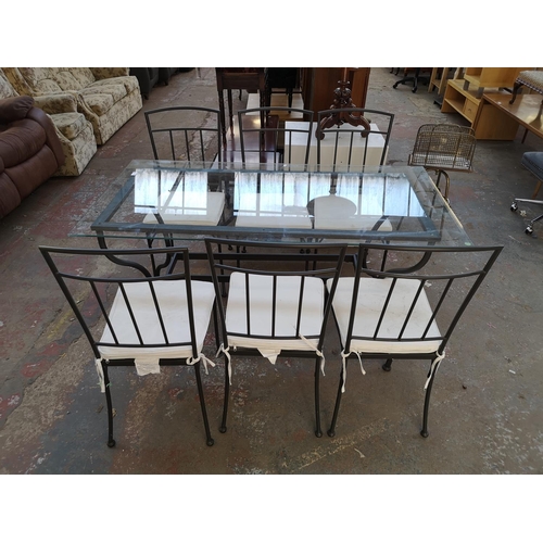 1092 - A modern wrought iron and glass top rectangular dining table and six matching chairs - approx. 77cm ... 