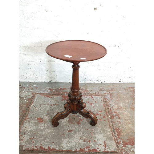 1093A - A Victorian mahogany tripod pedestal circular top wine table - approx. 61cm high x 36cm in diameter