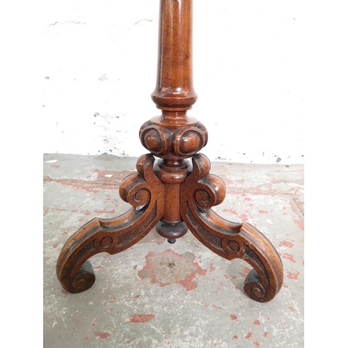 1093A - A Victorian mahogany tripod pedestal circular top wine table - approx. 61cm high x 36cm in diameter