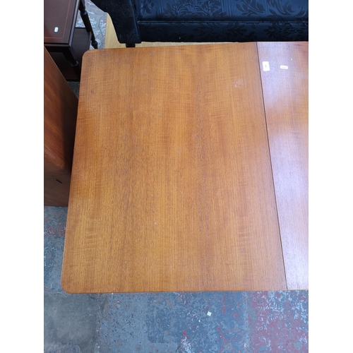 1095 - Three pieces of mid 20th century furniture, one teak drop leaf gate leg dining table, one teak and b... 