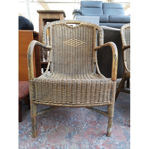 1096 - A pair of vintage gold painted wicker and bamboo armchairs