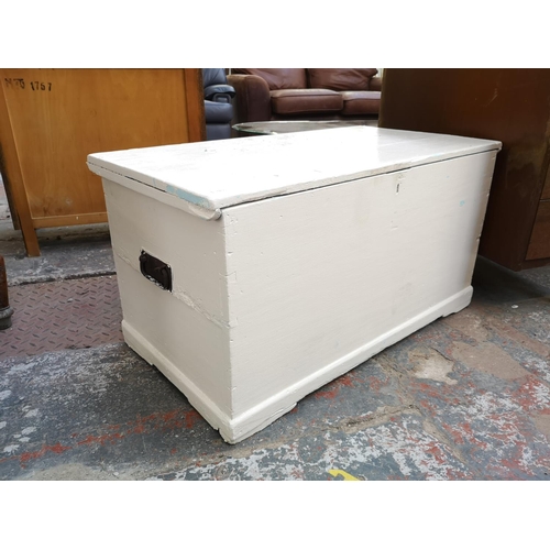 1099 - A Victorian white painted pine blanket box