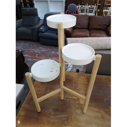 1100 - A modern white metal and beech three tier plant stand - approx. 78cm high