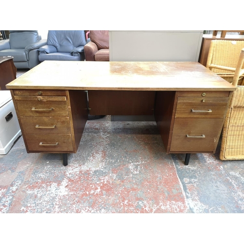 1101 - A mid 20th century Abbess Linear teak office desk - approx. 72cm high x 153cm wide x 76cm deep