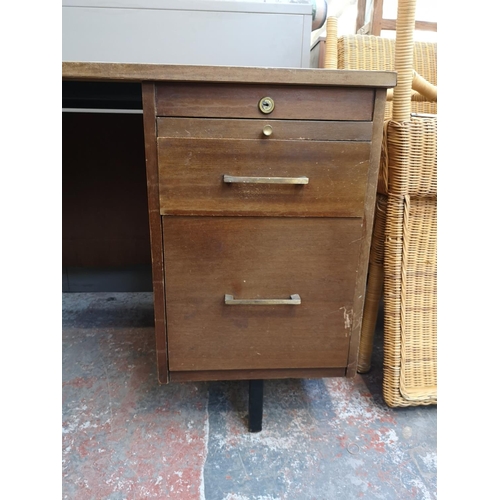 1101 - A mid 20th century Abbess Linear teak office desk - approx. 72cm high x 153cm wide x 76cm deep