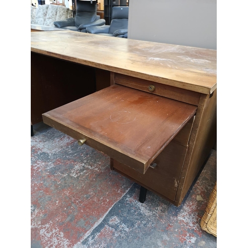 1101 - A mid 20th century Abbess Linear teak office desk - approx. 72cm high x 153cm wide x 76cm deep