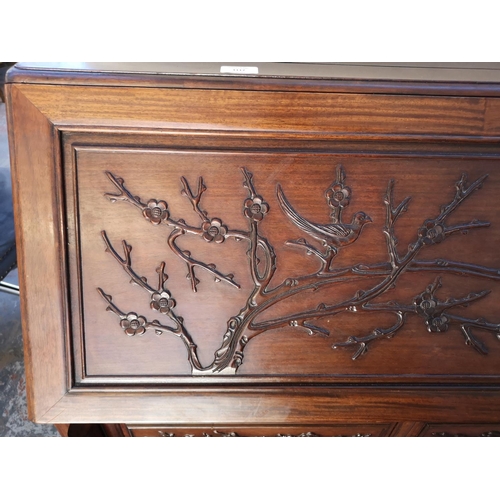 1117 - A Chinese rosewood bureau with two short drawers, two long drawers, fall front and bird and foliate ... 