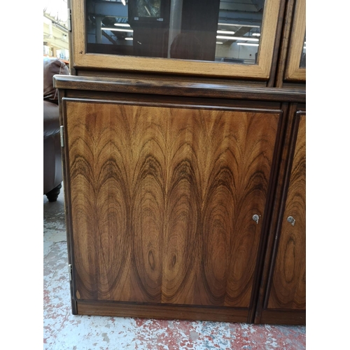 1128 - A mid/late 20th century rosewood effect display cabinet - approx. 181cm high x 120cm wide x 49cm dee... 