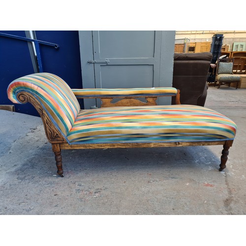 1065A - An early 20th century beech and fabric upholstered chaise lounge - approx. 77cm high x 60cm wide x 1... 