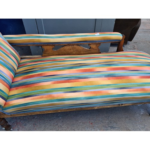 1065A - An early 20th century beech and fabric upholstered chaise lounge - approx. 77cm high x 60cm wide x 1... 