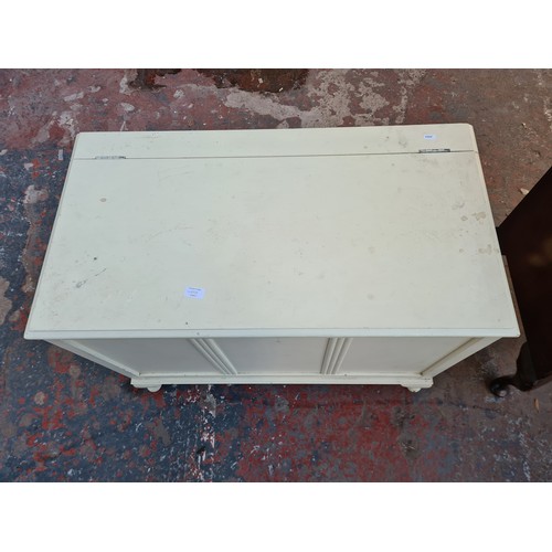 1065B - A mid 20th century white painted blanket box with cabriole supports - approx. 73cm high x 92cm wide ... 