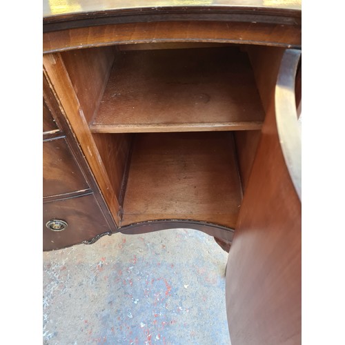 1065C - A Regency style mahogany sideboard with three central drawers and two outer cupboard doors - approx.... 