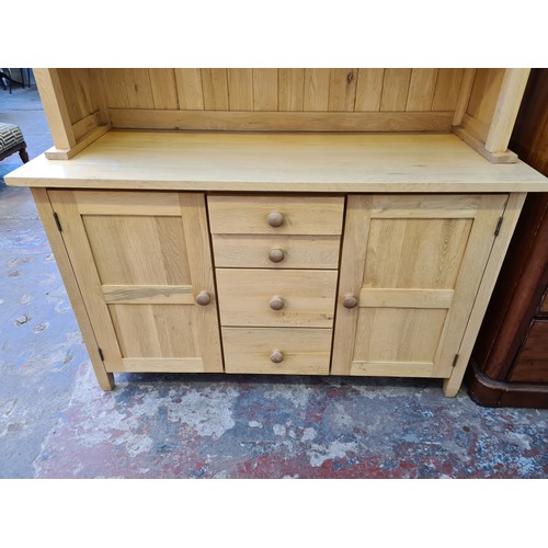 1024B - A modern solid oak dresser - approx. 190cm high x 130cm wide x 48cm deep