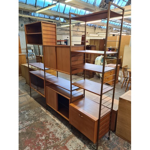 1008 - A 1960s Staples Ladderax teak and metal three bay modular wall system - approx. 200cm high x 247cm w... 