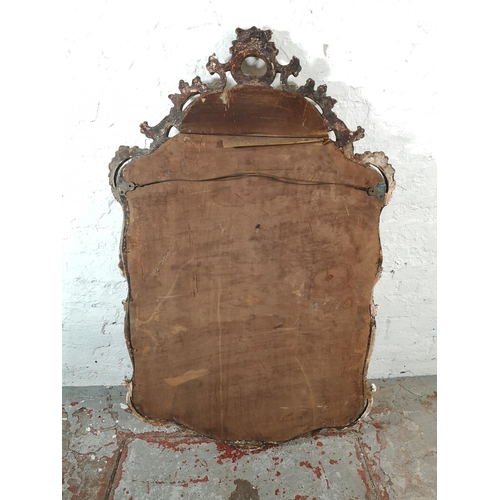 1164 - A Rococo style gilt framed wall hanging mirror - approx. 120cm high x 74cm wide