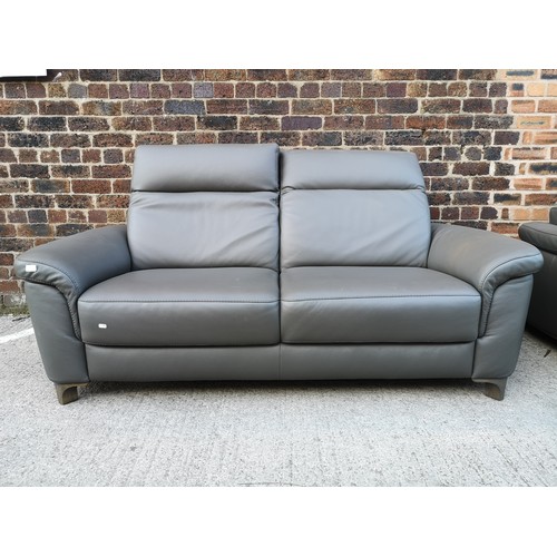 1069 - An ROM grey leather three piece lounge suite comprising two armchairs and two seater sofa