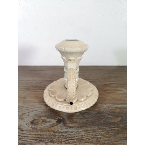 245A - A ceramic candlestick with unknown makers marks to base, provided by the Bossons family - approx. 13... 