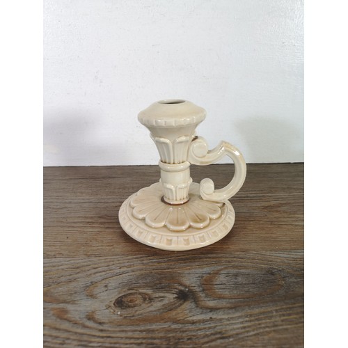 245A - A ceramic candlestick with unknown makers marks to base, provided by the Bossons family - approx. 13... 