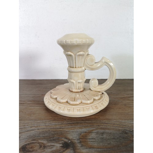 245B - A ceramic candlestick with unknown makers marks to base, provided by the Bossons family - approx. 13... 