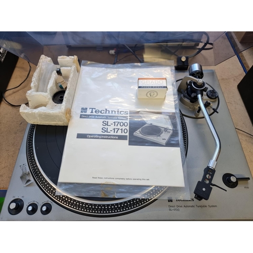 1492 - A Technics SL-1700 direct drive two speed turntable fitted with Grado Prestige cartridge and stylus ... 