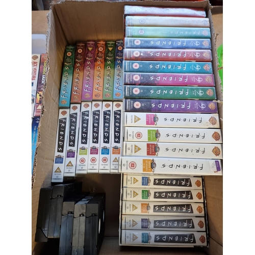 1510 - Three boxes containing a collection of VHS videos, DVDs and Blurays - see images for titles