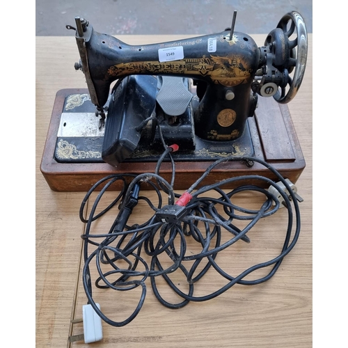 1549 - A c.1924 Singer electric sewing machine with two foot pedals - serial no. Y1956681